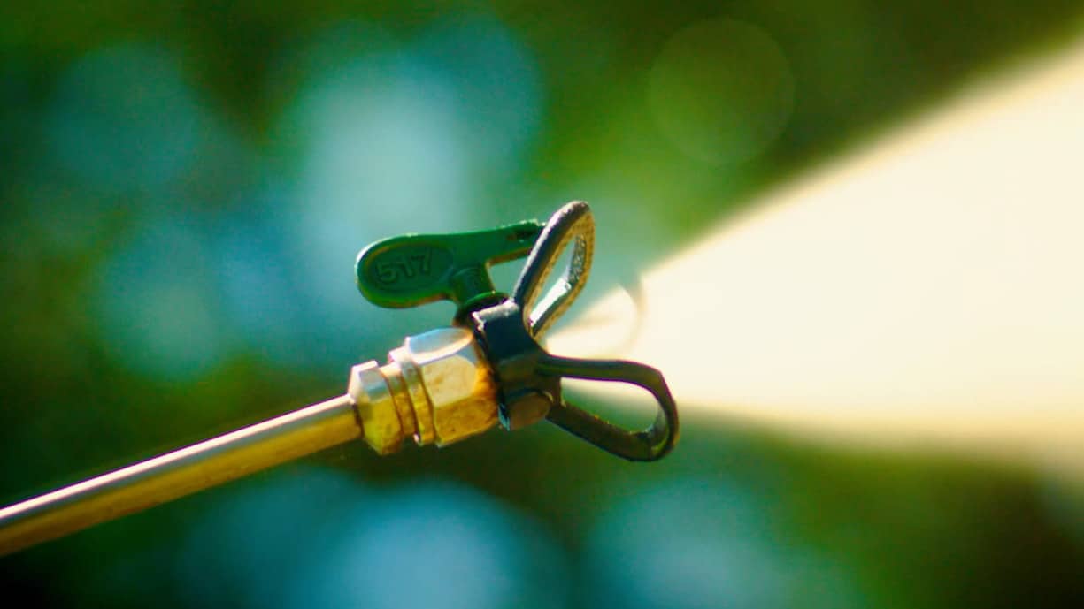 Sprayer with water coming out of the top.